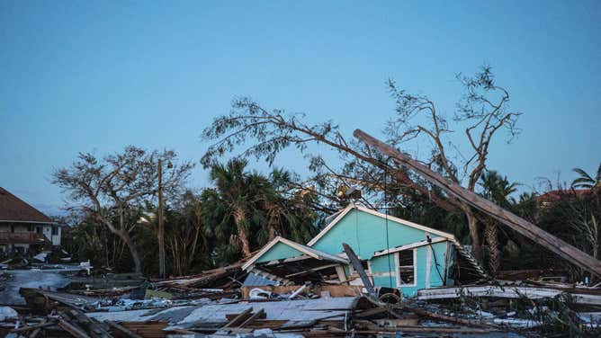 A destroyed beach front home that was carried across the street by the storm surge. Scenes of flooding and storm damage after Hurricane Ian ravaged Fort Myers Beach, Fla.