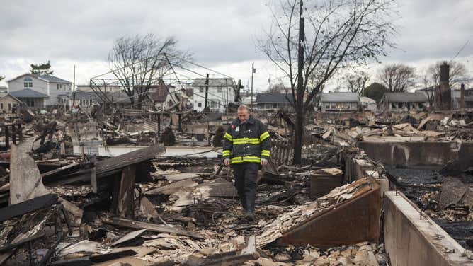 Superstorm Sandy wiped out many homes in NYC's Breezy Point borough with both water and fire.
