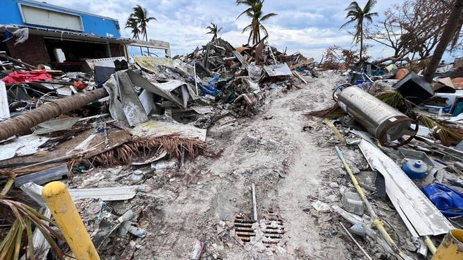 Debris from Hurricane Ian in Fort Myers Beach more than two weeks after the storm brought deadly storm surge to the Lee County, Florida community. (Image: Robert Ray/FOX Weather)