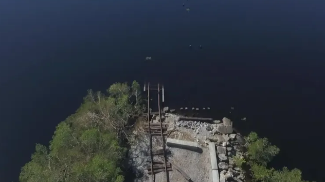 A photo showing one of several railroad bridges that were washed away by Hurricane Ian in Southwest Florida.