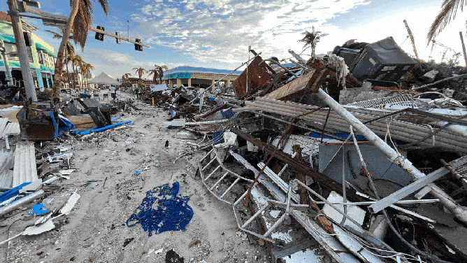 Piles of debris litter the landscape in Fort Myers Beach, Florida, after Hurricane Ian made landfall in late September.