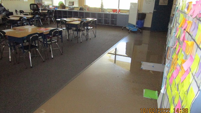 Standing water in The Sanibel School in Lee County after Hurricane Ian.