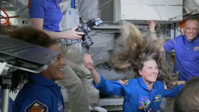 Cosmonaut Anna Kikina after entering the International Space Station for the first time.