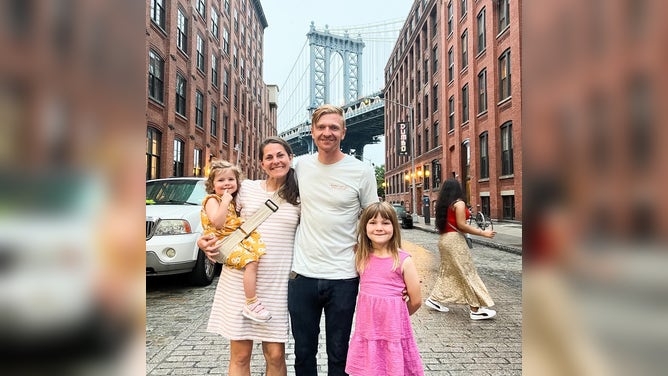 Pierce, Ruff and their daughters during a trip in New York City.