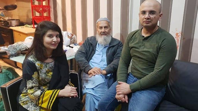 From left to right: Qadri's sister, his father and Qadri