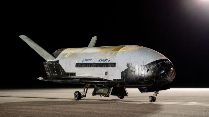 The X-37B orbital test vehicle on KSC's Launch and Landing Facility after concluding its sixth successful mission.