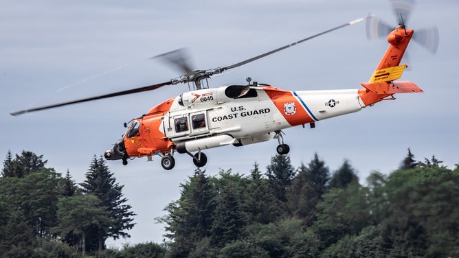 U.S. Coast Guard Jayhawk helicopter takes off from Air Station Sitka.