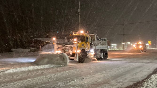 Snow plows from Western New York Region of New York State Department of Transportation, plowing Routes 5 and 20 in the town of Irving in Chautauqua County. Their crews are working day and night throughout a storm.