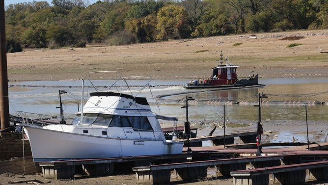 MEMPHIS, TENNESSEE - OCTOBER 19: Boats rest in mud at Riverside Park Marina in Martin Luther King Jr. Riverside Park along the Mississippi River on October 19, 2022 in Memphis, Tennessee. Lack of rain in the Ohio River Valley and along the Upper Mississippi has the Mississippi River south of the confluence of the Ohio River nearing record low levels which is wreaking havoc at marinas, and with barge traffic, driving up shipping prices and threatening crop exports and fertilizer shipments as the soybean and corn harvest gets into full swing.