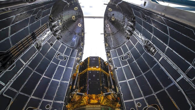 The ispace Mission 1 lunar lander integrated into the SpaceX Falcon 9 fairing.