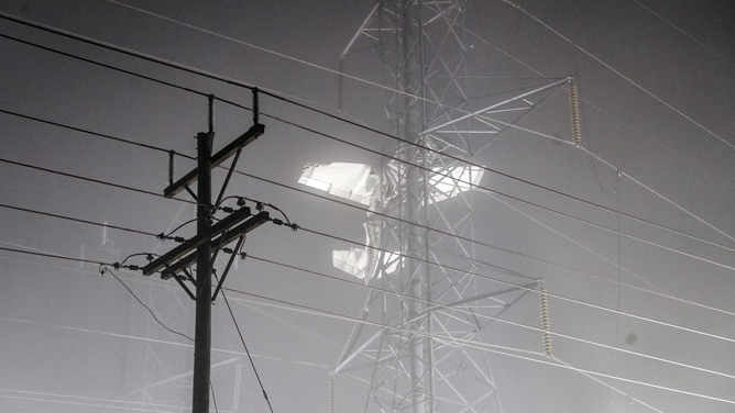 MARYLAND, UNITED STATES - NOVEMBER 28: Powerlines are seen after a small plane crashed into Transmission Tower in Maryland, United States on November 28, 2022. The crash caused widespread power outages in Montgomery County.
