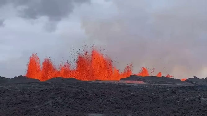An image showing lava from Hawaii's Mauna Loa volcano shooting nearly 150 feet into the air.