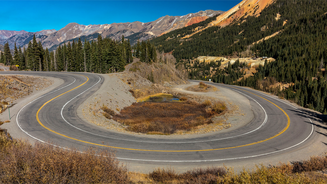 FILE - 'Circular elevated view of Colorado State Highway 550, known as 'Million Dollar Highway' threads its way from Silverton to Ouray.