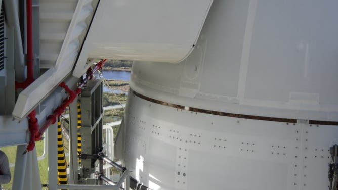 The area where caulk on a seam between the Orion launch abort system’s ogive and crew module adapter detached during Hurricane Nicole.