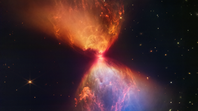 The protostar within the dark cloud L1527, shown in this image from NASA’s James Webb Space Telescope Near-Infrared Camera (NIRCam), is embedded within a cloud of material feeding its growth.