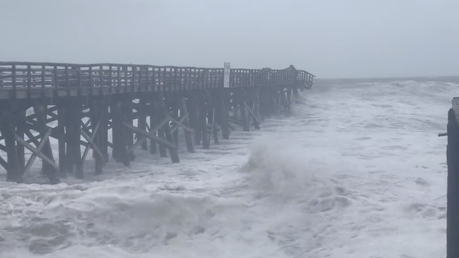 Nicole's dangerous storm surge washes away homes, roads, boardwalks ...