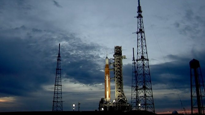 The sun sets on NASA's Space Launch System rocket and Orion spacecraft on Nov. 15, 2022 during the third launch attempt for the space agency.