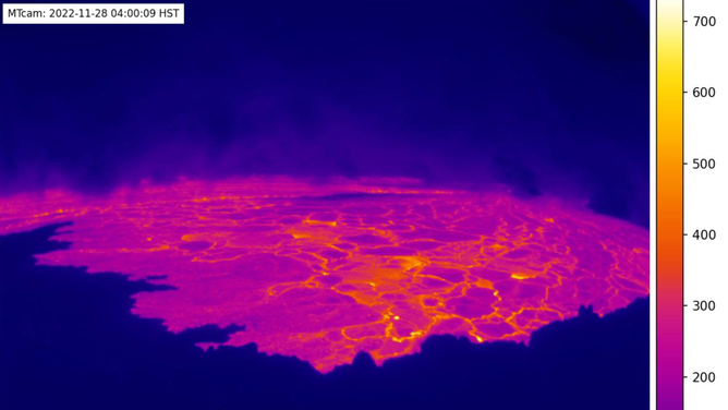 This image is from a temporary thermal camera located on the north rim of Mauna Loa's summit caldera on Hawaii's Big Island. The temperature scale is in degrees Celsius up to a maximum of 500 degrees (932 degrees Fahrenheit) for this camera model, and scales automatically based on the maximum and minimum temperatures on the caldera floor and not the whole frame, which sometimes results in the rim (bottom of image) looking saturated (white).