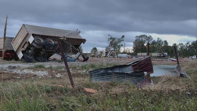 A truck is seen on its side following a tornado in New Boston, Texas, on Friday, November 4, 2022.