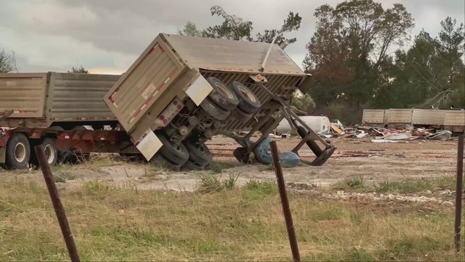 A truck is seen on its side following a tornado in New Boston, Texas, on Friday, November 4, 2022.