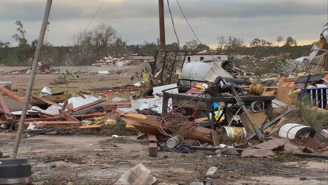 Debris is seen littering the landscape after a tornado in New Boston, Texas, on Friday, November 4, 2022.