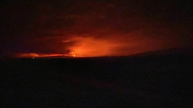 Mauna Loa eruption as viewed from Waikoloa at about 1:25am local time (HST). The eruption is occurring from the summit of the volcano, though lava has overflowed the caldera.