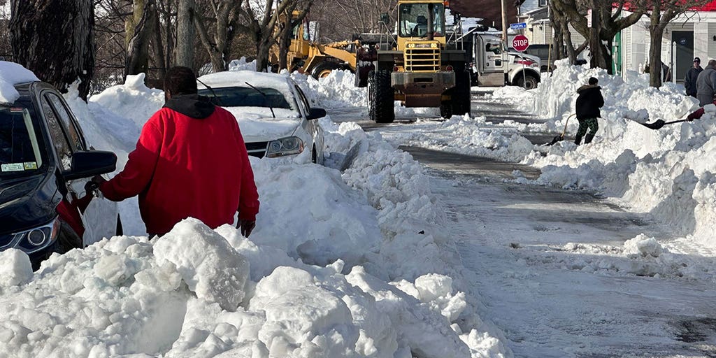 Mountains of snow': Buffalo residents say they expect to be clearing snow  for days