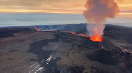 Hawaii's Mauna Loa volcano eruption continues: New aerial video shows lava edging closer to main highway