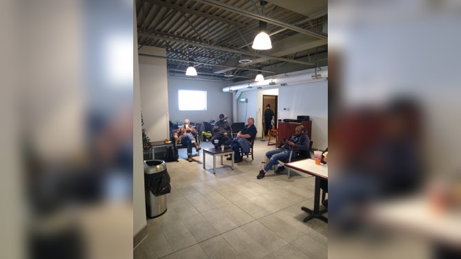 Semi trucks were buried during a blizzard in South Dakota forcing their drivers to stay at a fuel stop for days. (Image credit: TIM PLETTEN)
