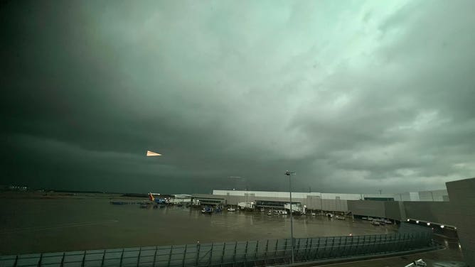A dark ominous sky over Dallas Love Field Airport on Dec. 13, 2022 during an active severe weather threat.