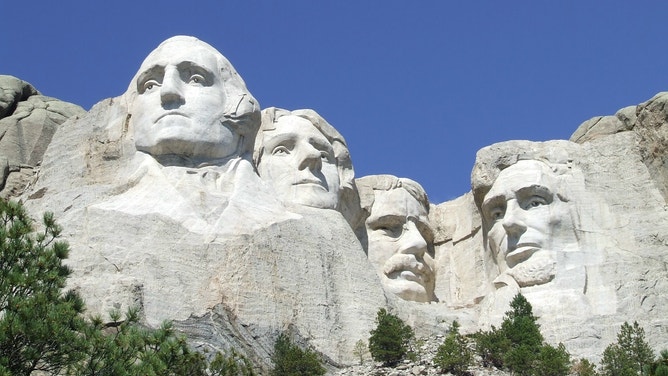 Mount Rushmore National Memorial on a clear, sunny day.