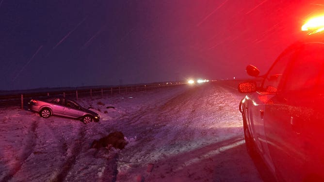 Minnesota State troopers respond to a vehicle that slid off the road.