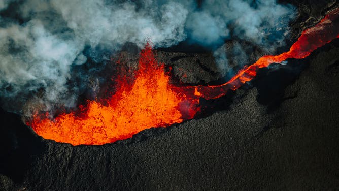 In an aerial view, lava continues to erupt from the Mauna Loa volcano on December 7, 2022 in Hawaii.
