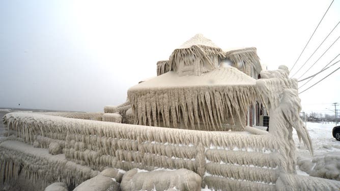 Ice covers Hoaks restaurant along the Lake Erie shoreline on December 24, 2022 in Hamburg, New York. The Buffalo suburb and surrounding area was hit hard by the winter storm Elliott with wind gusts over 70 miles per hour battering homes and businesses through out the holiday weekend. (Photo by John Normile/Getty Images)