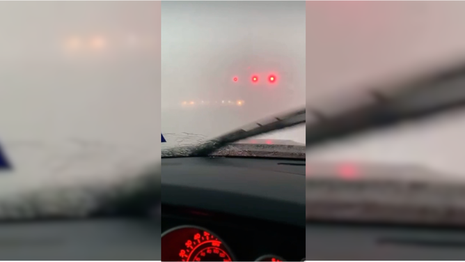 Heavy rain made it nearly impossible for driver Blake Foster to see through his windshield. The storm hit Grapevine, TX on December 13, 2022.