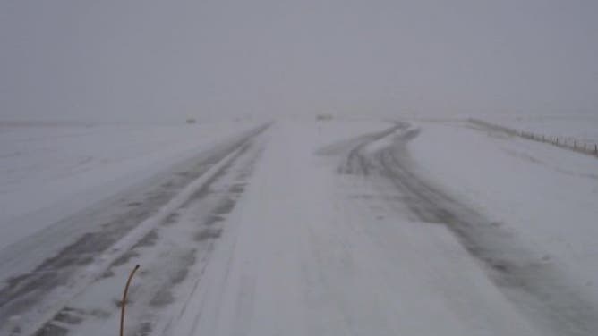 Freezing rain, heavy snow and high winds closed Interstate 90 in South Dakota on Dec. 13, 2022.