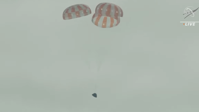 On Dec. 11, 2022 NASA's Orion spacecraft comes back down to Earth landing in the Pacific Ocean on parachutes after a 25.5-day mission around the moon.