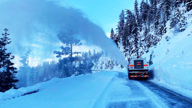 Snow plow clears Lake Tahoe highway