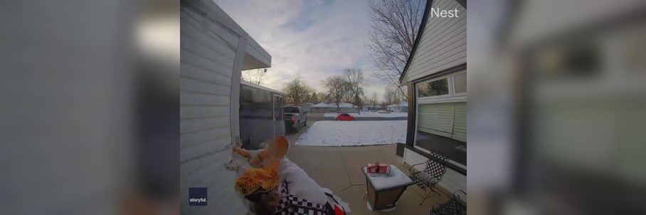 Snack attack: Watch as girl gets face full of pasta after slipping on icy driveway