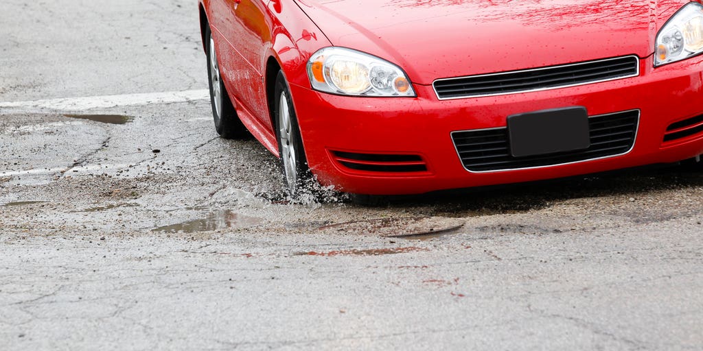 Who is on the hook for your car’s pothole damage? It may not be all on you