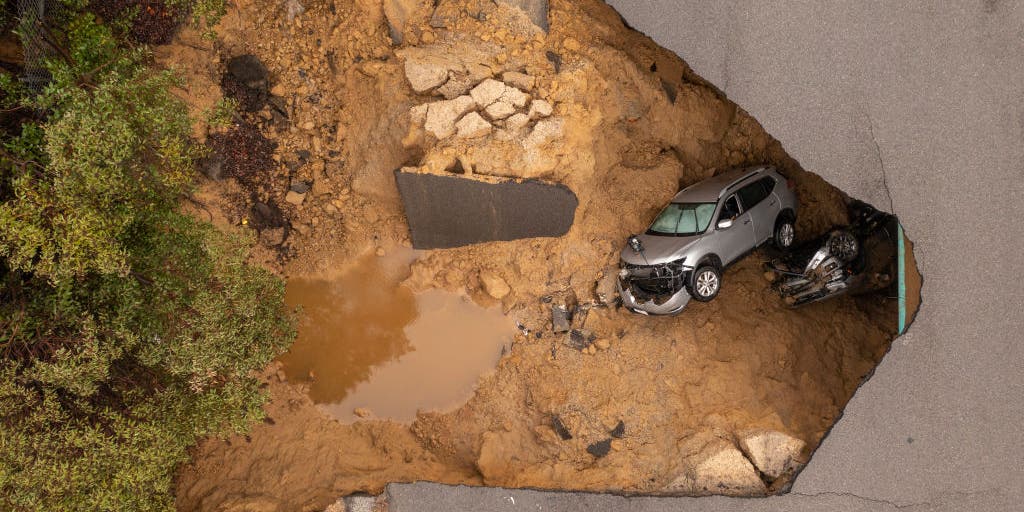 California scenes show devastation from flooding sinkholes amid