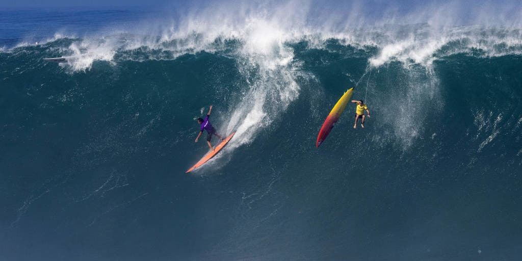 Surfing 50 deals foot waves