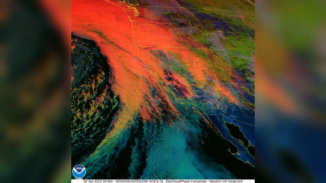NOAA satellite GOES West (GOES 18) observers the cooling cloud tops in RGB of the atmospheric river slamming into the West Coast on Jan. 4, 2023, the first day of the satellites new operational period.