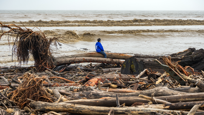 Driftwood storm debris on Capitola Beach in Capitola, California, US, on Saturday, Jan. 14, 2023. Storm-weary California is bracing for new round of drenching rains, heavy snowfall and dangerous winds as the death toll from a series of atmospheric rivers reached 19 people.