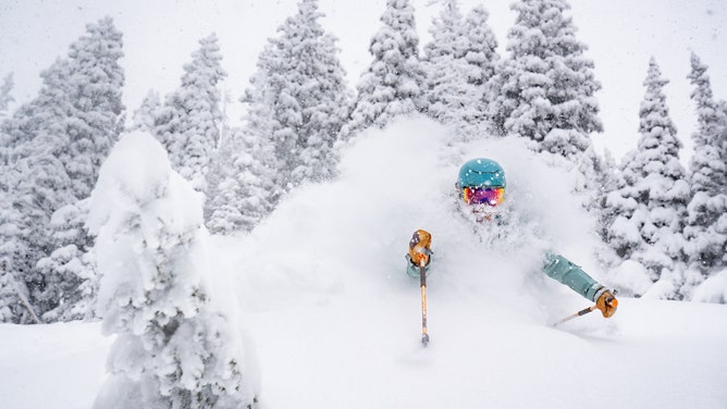 An athlete skis powder laps at Alta Ski Area in Utah.