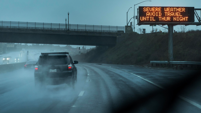 Warning messages for drivers are posted along US Highway 101 in Marin County before a powerful storm arrives to the area in Novato, California on Wednesday January 4, 2023.