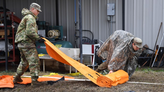 Soldiers from Cal Guard’s 649th Engineer Company are currently supporting the Sacramento Sheriff at the Rio Consumnes Correctional Center in Elk Grove to install flood dams and sandbags as northern California prepares for more storms midweek.