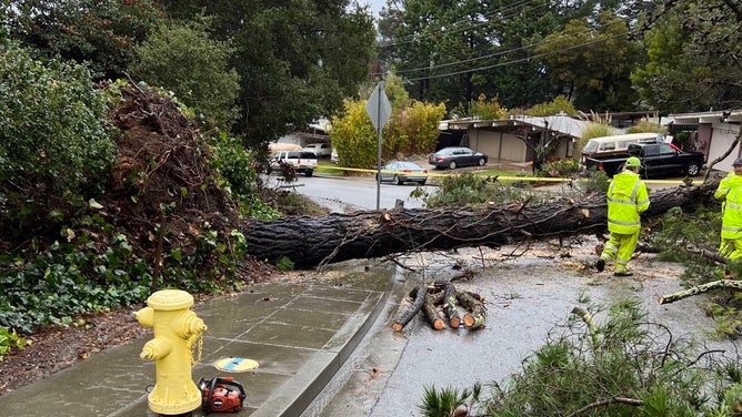 San Mateo County Dept. of Public Works remains continues to clear roads and debris on January 5, 2023, after a bomb cyclone struck California. 