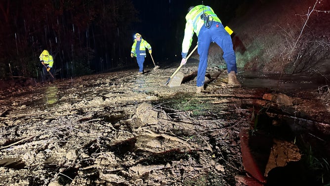 CALFire crews clearing mud and debris from a series of storms moving through the region.