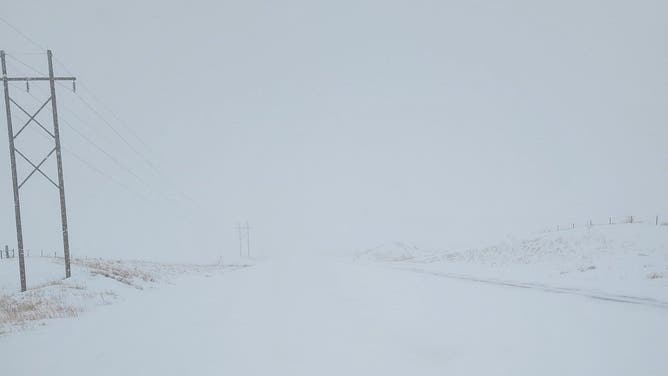 Snow covers Highway 83 south of North Platte, Nebraska on January 18, 2023.